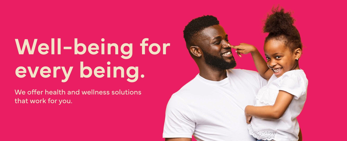 The image shows a man holding a smiling girl who playfully touches his nose. The text reads, "Well-being for every being. We offer health and wellness solutions that work for you."